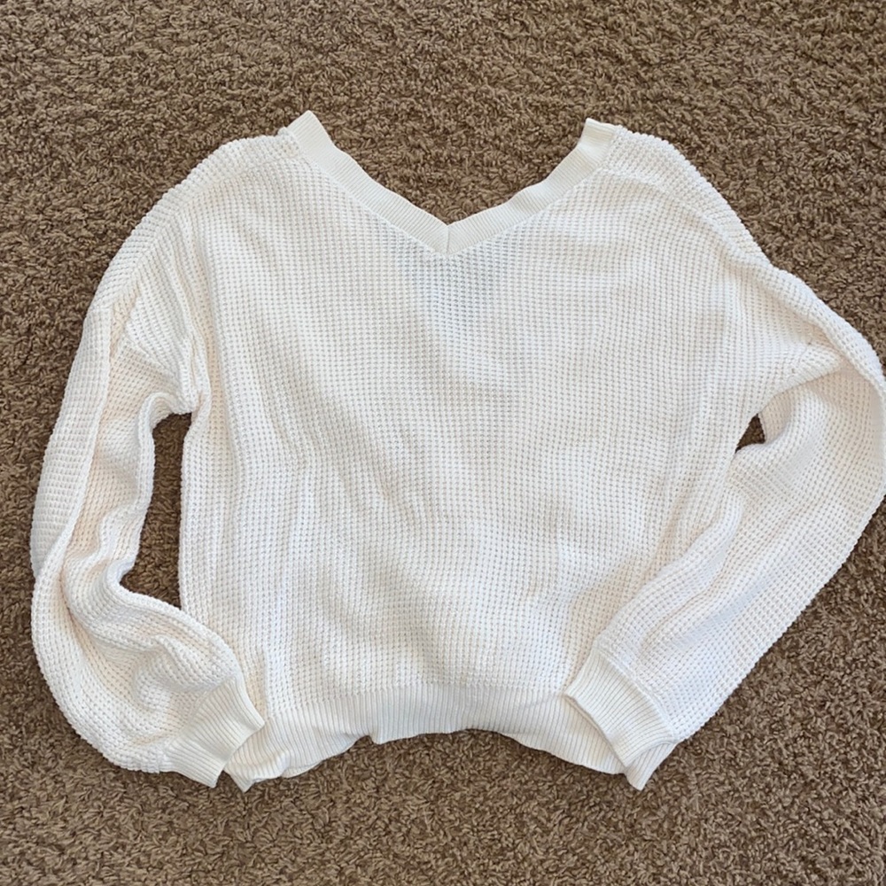Cream sweater with knotted front/back
